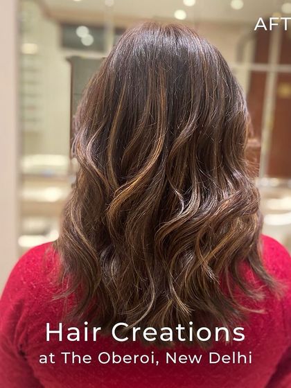 A beautiful after-shot of a textured haircut with honey gold highlights. The waves perfectly showcase the interplay of light and colour, creating a rich, dimensional effect.