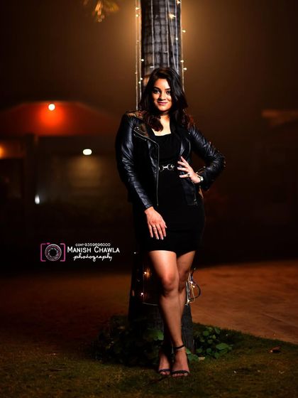 A shot from my show in Muzaffarnagar, posing by a lit-up tree after the performance.