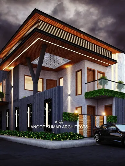 This angle reveals a unique structural element: a V-shaped column that supports the upper floor, adding a sculptural touch to the modern architectural design.