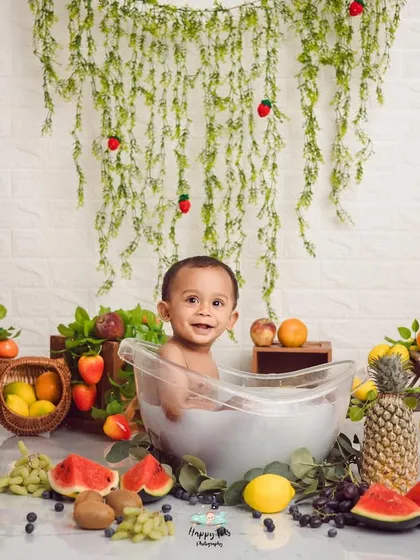Our milk bath sessions are pure joy. We fill a tiny tub with a safe, warm bath and lots of colorful fruits, creating a playful sensory experience that brings out the biggest smiles.