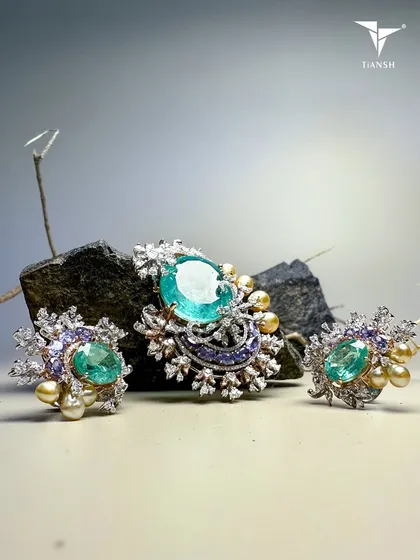 Emeralds that feel like whispers of ancient forests, diamonds that mimic starlight, and pearls that carry the hush of the ocean. This set is nature’s poetry, sculpted into a masterpiece.