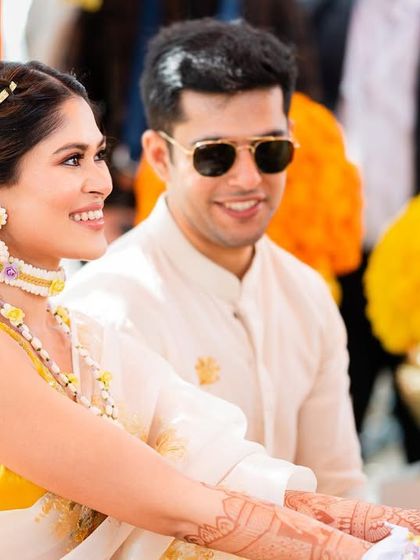 A sun-kissed Haldi ceremony in Udaipur. For this daytime event, we created a very natural and dewy look with floral hair accessories to match the festive vibe.