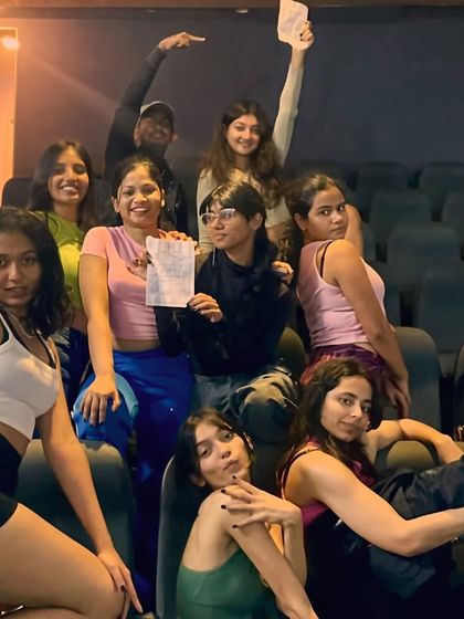 A moment of fun and friendship backstage. The bonds formed during our performance batches are one of the most rewarding parts of the experience.