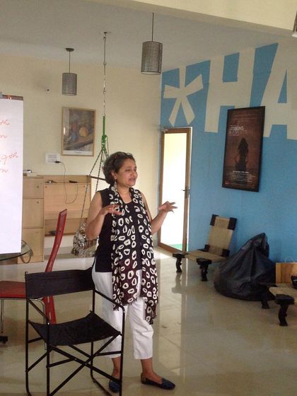 A literary agent explaining the nuances of the publishing industry. We ensure our writers are prepared not just to write a book, but to get it into the hands of readers.