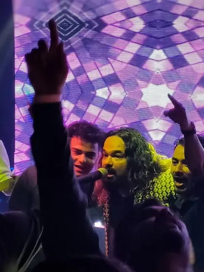 In the middle of the crowd, singing along with everyone. We break the barrier between the stage and the audience, making every gig an interactive, shared experience.