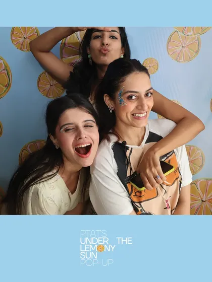 Pure joy and glitter at the PTAT pop-up. We capture the fun, candid moments that define the atmosphere of a public event.