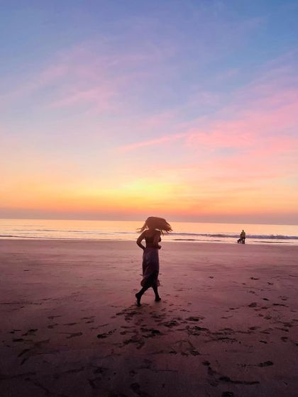 Walking barefoot on the sand. This photo embodies the lesson of staying grounded, connected to the earth, and not taking life too seriously.