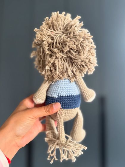 A look at the fluffy, hand-tied mane of our Toto the Lion toy. It's this attention to detail that brings our crochet friends to life.