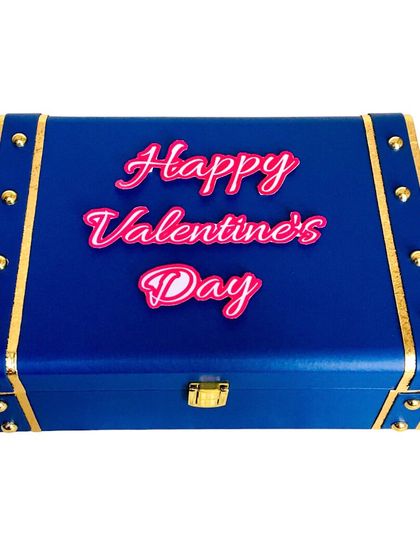 A classic Valentine's Day trunk, ready to be filled with love. The bold "Happy Valentine's Day" on this royal blue trunk makes a statement before it's even opened.