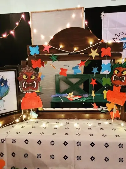 Welcome to our magical Kamishibai theatre! We decorate our Japanese paper story box for every theme, using fairy lights and handmade puppets to create an enchanting atmosphere that pulls children right into the world of the story.