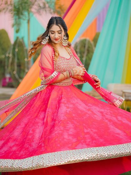 Another twirl, because a good lehenga deserves it. This shows the beautiful flare of the skirt, a key selling point for ethnic wear.