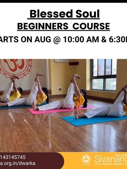 A view of our beginner class practicing a supine leg stretch. The course is designed to systematically build your strength and flexibility.