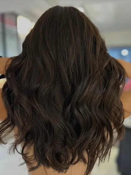 No-bleach baby lights are a great way to add subtle dimension. I paired this color with soft textured layers on mid-length hair for a gentle, beautiful result.