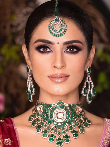 A direct, powerful portrait. The smokey eye and nude lip combination is a timeless choice for brides who want a look that is both glamorous and sophisticated.