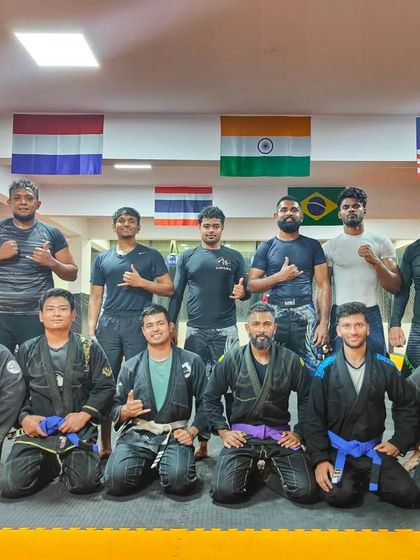 The mat is our proving ground. A shot of the team after another challenging Jiu-Jitsu session, ready for more.