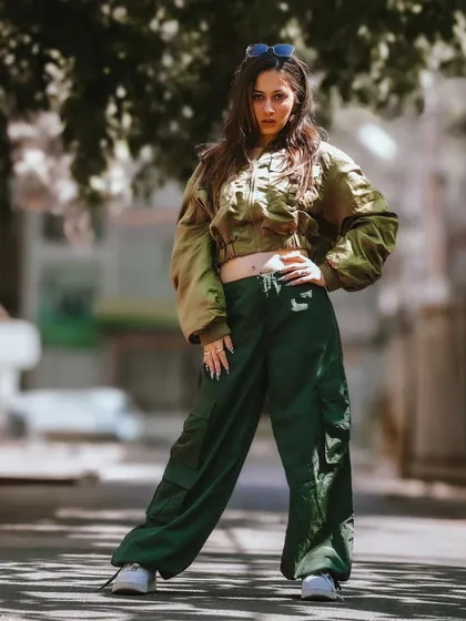 Capturing the raw energy of Bangalore's streets is one of my specialties. This is a full-body shot from a street style portfolio session, showcasing a confident pose and an outfit that blends modern trends with personal style.