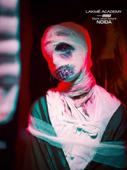 A full view of the mummy character. The tattered bandages and blood effects are key elements of special effects makeup that we introduce in our courses.