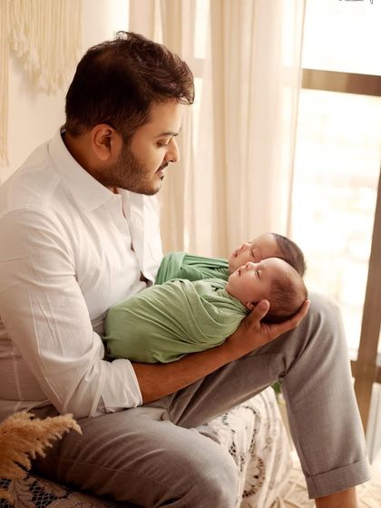 A father's love. This portrait of a dad holding his two newborn babies is so powerful. I love creating space for these one-on-one moments during the shoot.