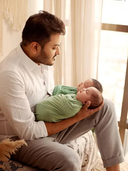 A father's love. This portrait of a dad holding his two newborn babies is so powerful. I love creating space for these one-on-one moments during the shoot.