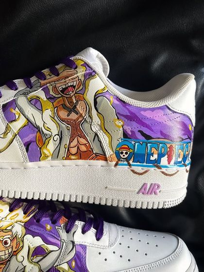 A close-up shot of the One Piece custom sneaker, focusing on Luffy's joyful expression in his Gear 5 form.