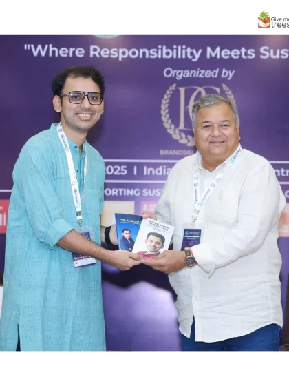 Exchanging ideas and books with fellow speakers. The journey towards a sustainable future is a collective one, built on shared knowledge and mutual respect.