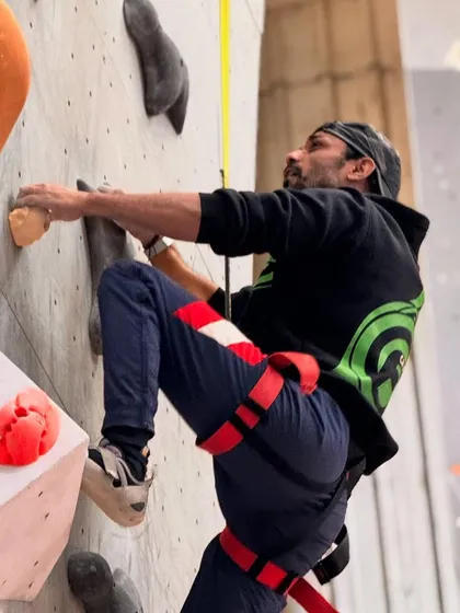 A climber in action during our speed climbing event. These competitions are fast-paced, exciting, and a great spectacle for everyone.