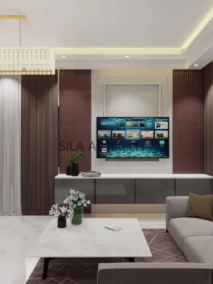 A living room designed with a European interior theme. This render showcases a sophisticated TV unit, elegant drapery, and a neutral color palette accented with rich brown tones for a classic yet modern feel.