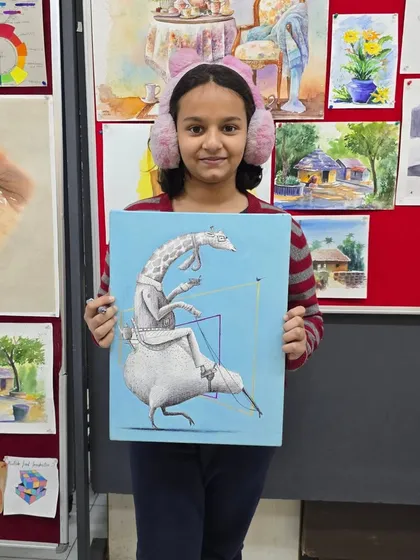 A young student proudly displays her completed ballpoint pen artwork, a whimsical piece that showcases her unique artistic voice.