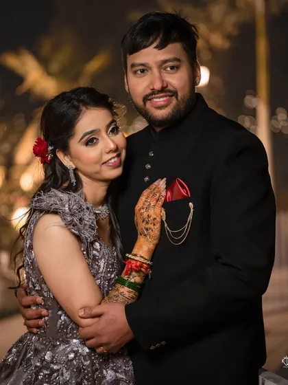 A classic posed portrait of the newly engaged couple. The soft lighting and their happy expressions make this a timeless keepsake.