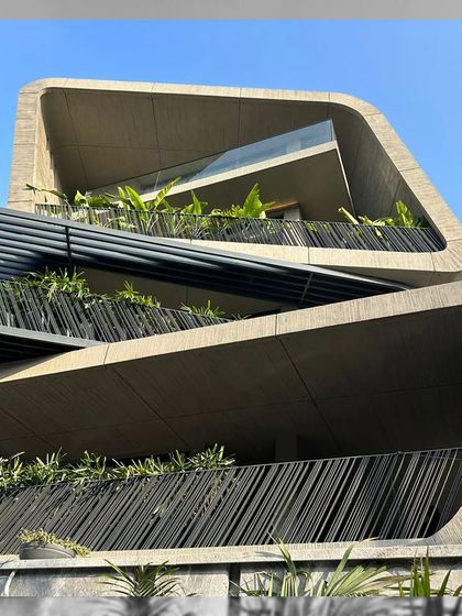 A detail of the dynamic, multi-level balconies. Each tier is crafted with precision to offer unique perspectives and panoramic views, seamlessly blending the indoor and outdoor living experience.