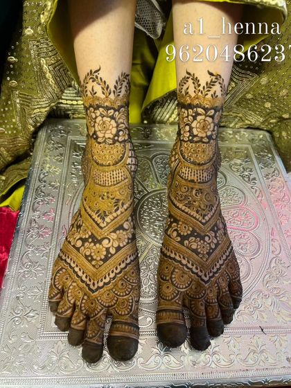 Another angle of Shafin's bridal feet, showing the detail and symmetry of the design.