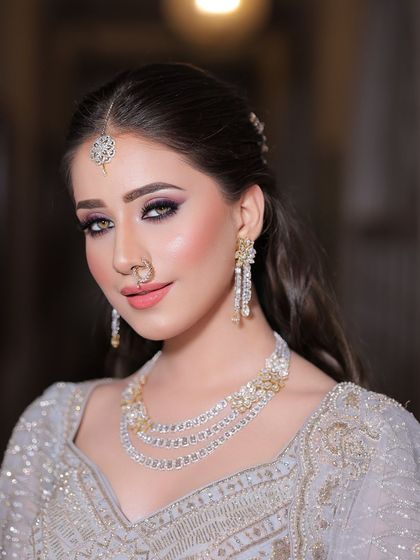 Another angle of this serene and enchanting engagement look. The makeup is designed to be flawless and radiant from every perspective.
