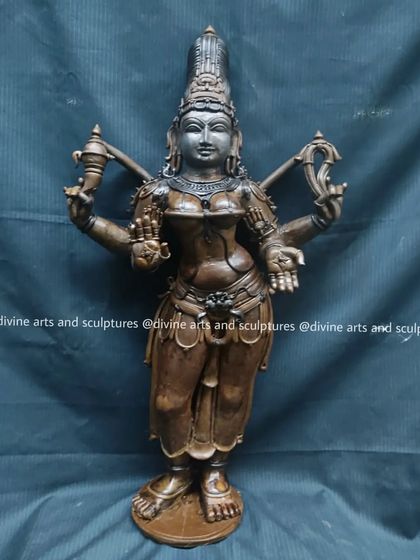 Another angle of the Bhuvaneswari wax model, showing the graceful contours and traditional attire that are characteristic of the Chola style of sculpture.