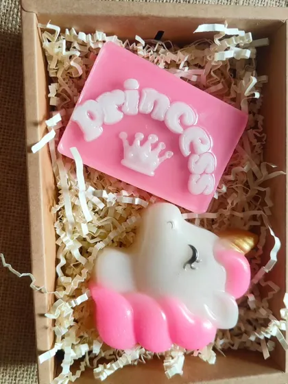 A magical unicorn and princess gift box. This set includes a "Princess" soap and a large unicorn head soap, both made from gentle goat milk.