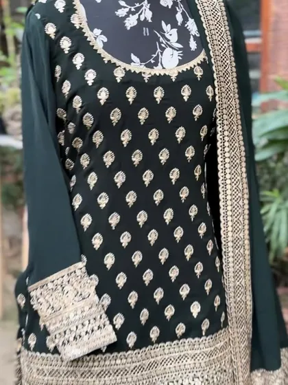A closer look at our latest collection featuring zari and sequin work. This deep green color is regal and timeless.