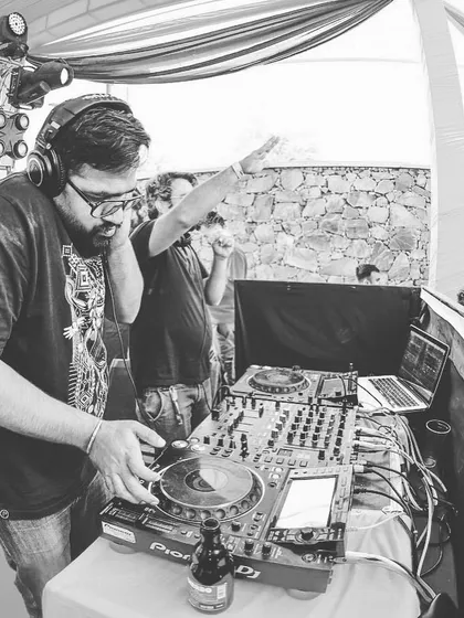 Lost in the music. This shot captures me in my element during an open-air psytrance set. It's all about connecting with the music and the crowd to create a shared experience.