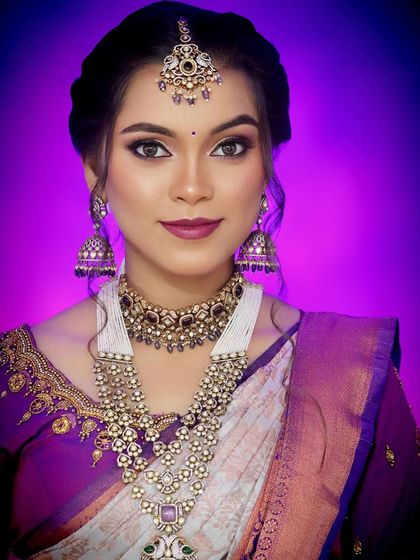 This set of photos shows a muhurtham look created with our purple Victorian jewellery. It demonstrates how non-traditional colours can also look stunning with bridal wear.