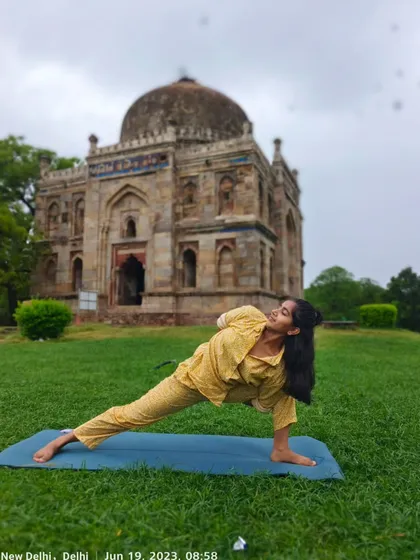 A side lunge variation in the serene environment of Lodhi Garden. The blend of history and nature makes this one of my favorite places to practice.