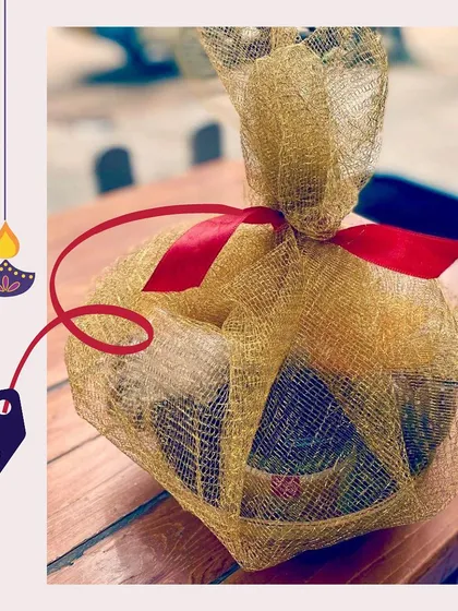 Our Diwali Pawsket, all wrapped up and ready to bring some festive cheer to your furry friend. This beautiful gift is packed with a variety of our best-selling dog treats.