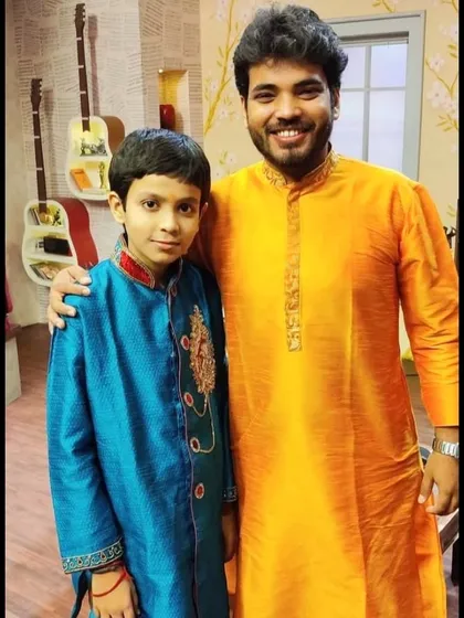 With the prodigious young flute player Anirban Roy before a performance. It is inspiring to see such dedication at a young age, and I welcome students of all ages to begin their musical journey with me.