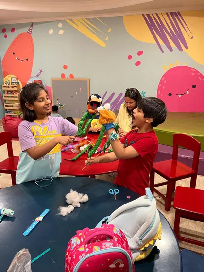 Teamwork makes the dream work, especially when you're making puppets. Our craft sessions are filled with collaboration, laughter, and creativity as children work together on fun projects.