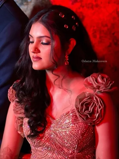 Another beautiful shot under dramatic red lighting. The makeup is versatile enough to look gorgeous in any lighting condition, from natural daylight to colorful party lights.