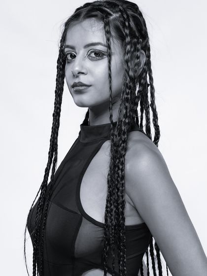 A classic three-quarter portrait in black and white, a staple for any model's book.