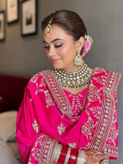 A serene, eyes-closed shot showcasing the soft blending of her eye makeup.