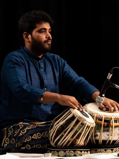 A moment of focus during my performance at the India International Centre, Delhi.