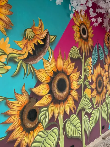 A close-up of the finished sunflowers. I use shadows and highlights to give them a 3D feel even though it's a 2D painting.