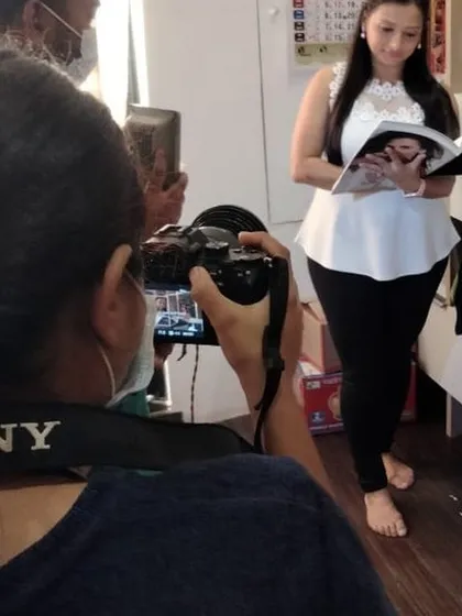 Behind the scenes at a photoshoot. Whether I am planning an event or being featured in a magazine, I bring the same level of dedication and attention to detail to everything I do.