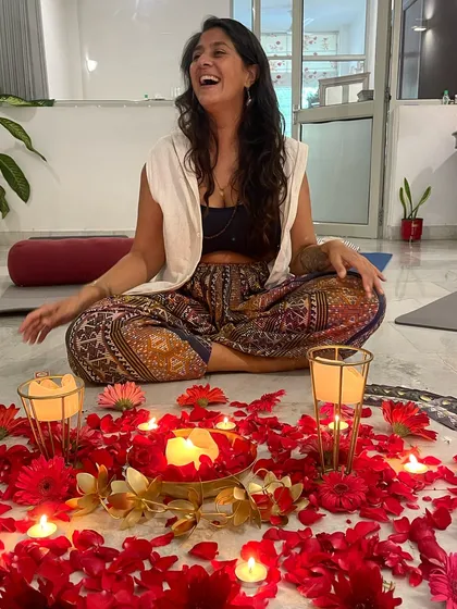 The joy and laughter that fills our space during a women's circle. The candles and flowers create a warm, inviting atmosphere for sharing and connection.