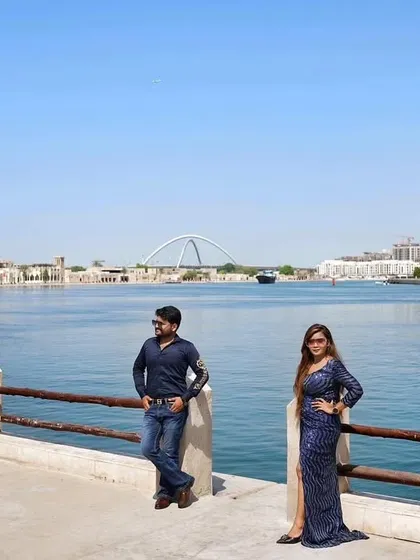 A stunning view of the Dubai skyline from across the water. This shot establishes the sense of place and the grand scale of a destination shoot in this iconic city.