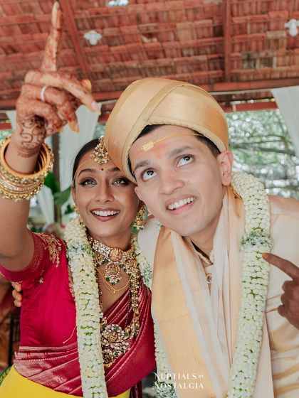 Love should also be fun! This playful shot captures the happy, energetic spirit of a wedding day, showing a different side of a couple's story.